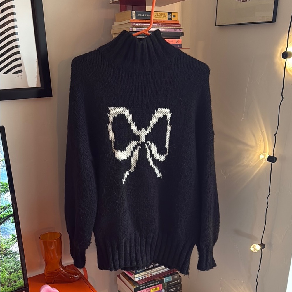Lisa Says Gah! Black Sweater with White Bow Design